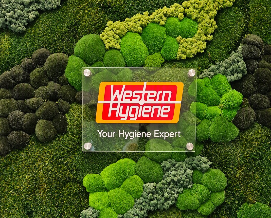 Western Hygiene sign on a living moss wall